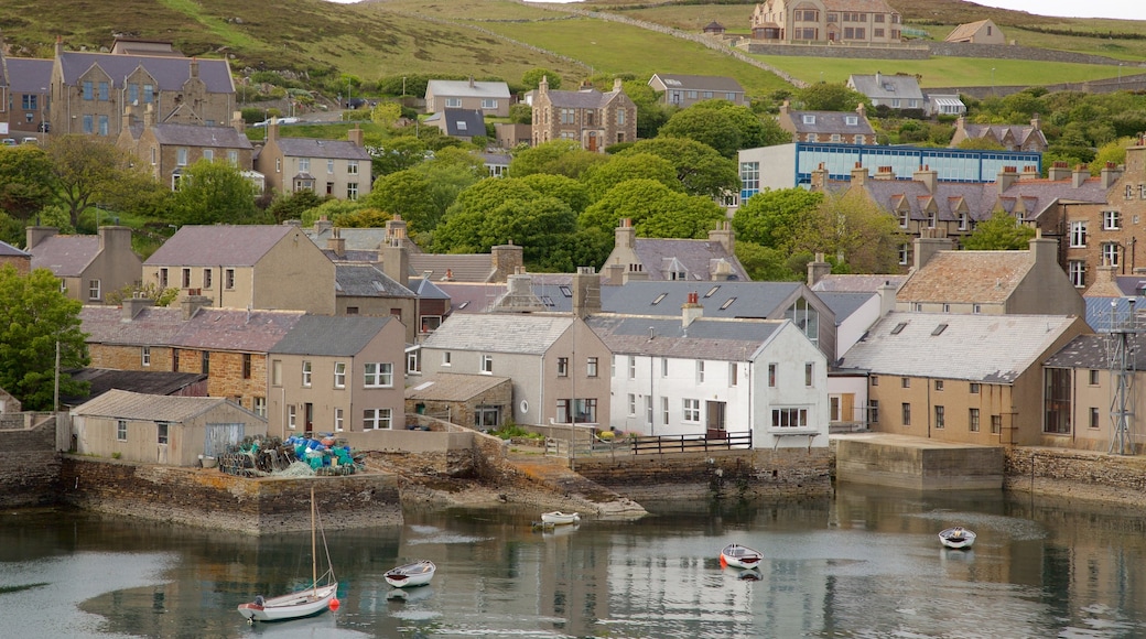 Stromness which includes a bay or harbour and a coastal town