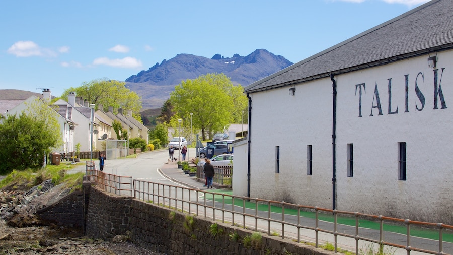Talisker Distillery which includes street scenes, heritage elements and mountains