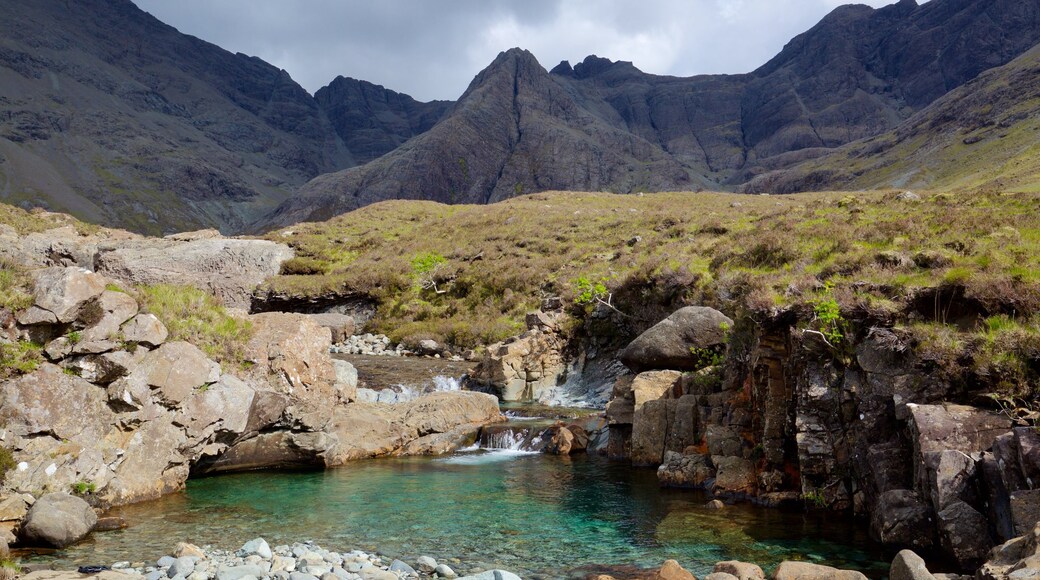 Isle of Skye which includes a pond, tranquil scenes and mountains