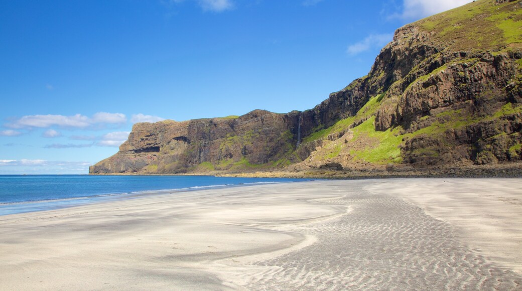 Isle of Skye which includes a sandy beach, tranquil scenes and rugged coastline