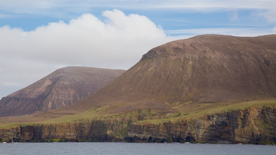 Ward Hill showing rocky coastline and mountains