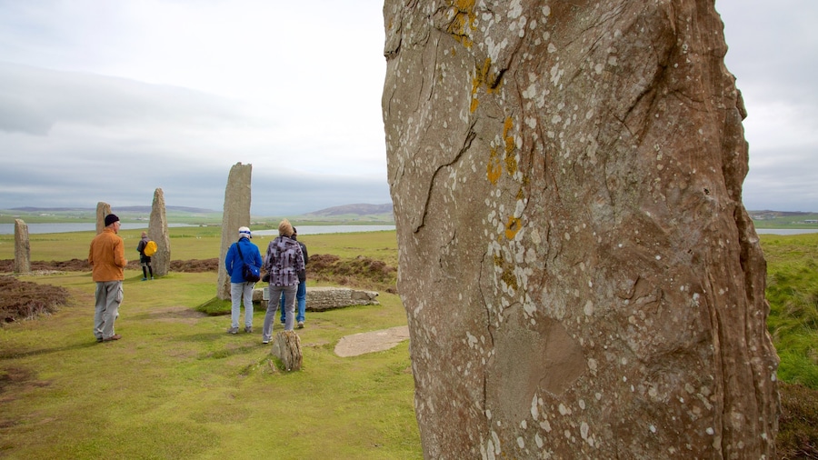 Ring of Brogdar showing a monument and heritage elements as well as a small group of people