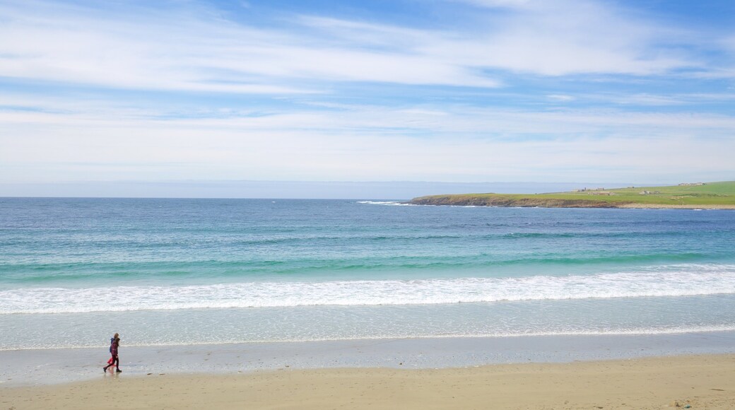 Stromness which includes a bay or harbour, a beach and tranquil scenes