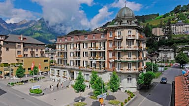 Engelberg which includes a small town or village and a square or plaza