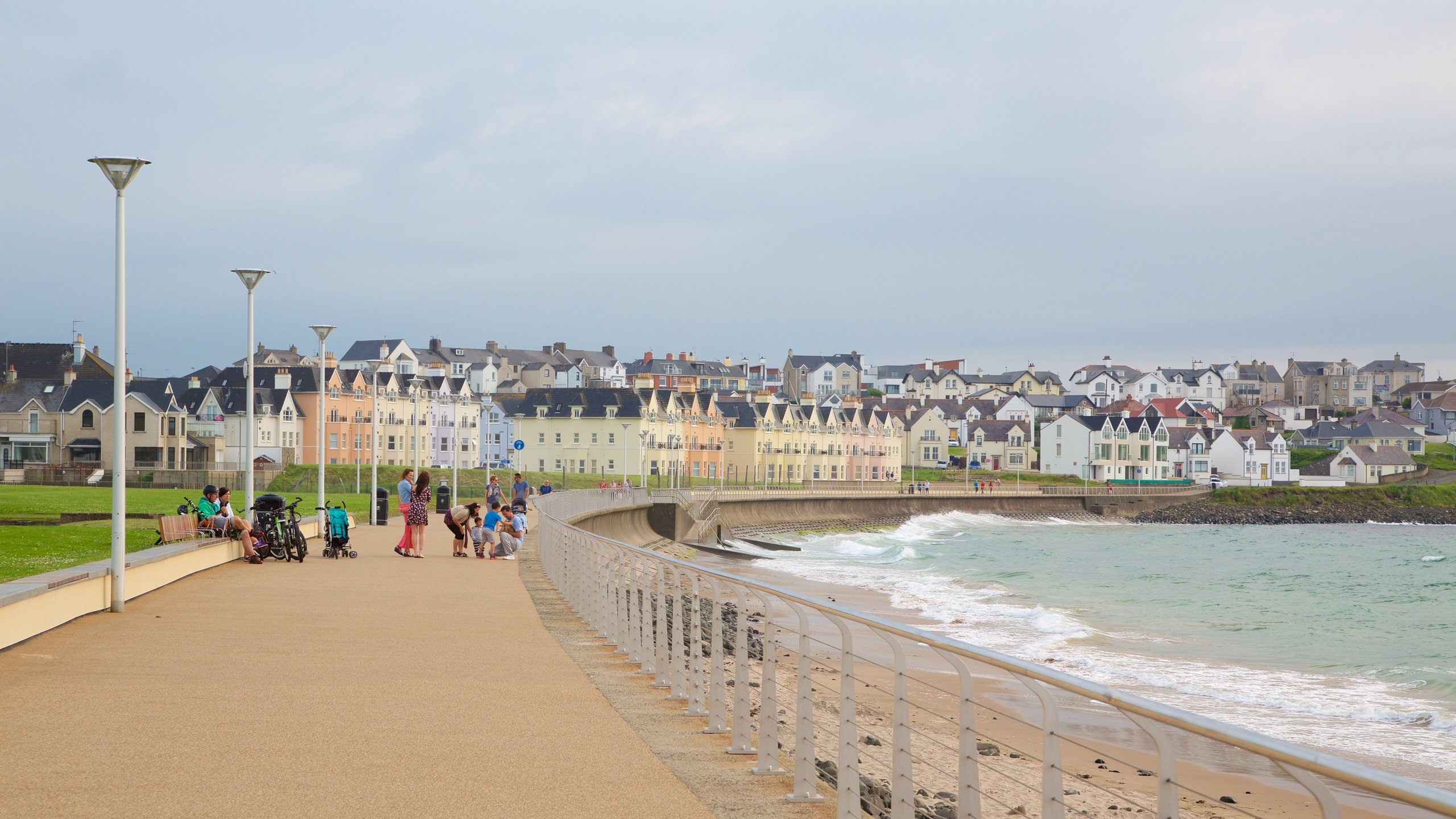 Portrush showing general coastal views, a bay or harbor and a beach