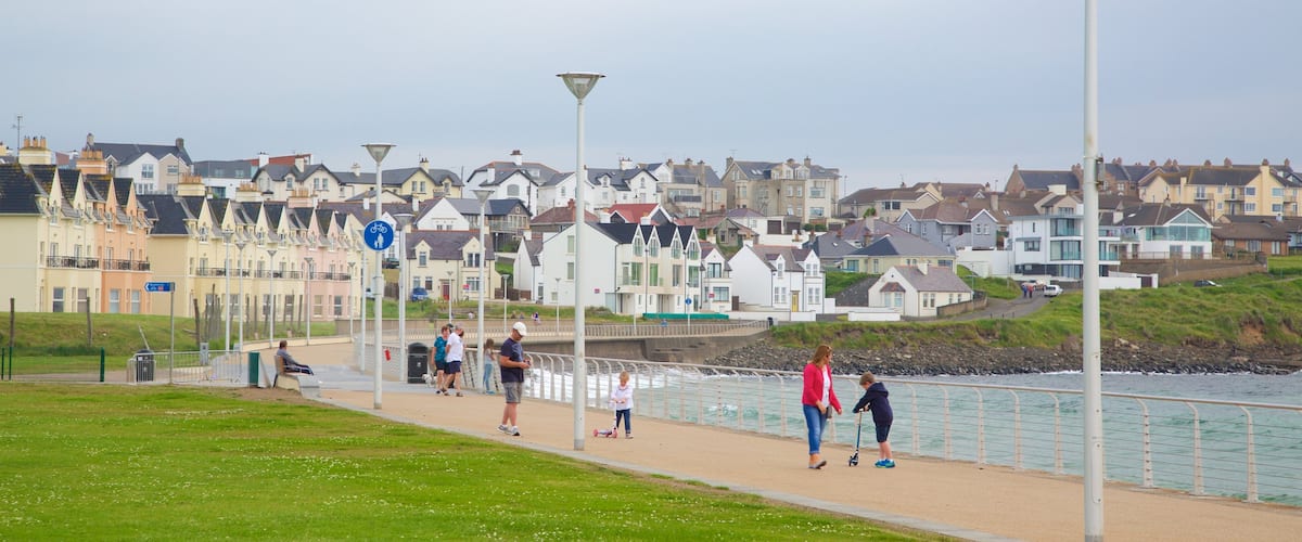 Portrush Beach featuring a bay or harbor, general coastal views and a coastal town