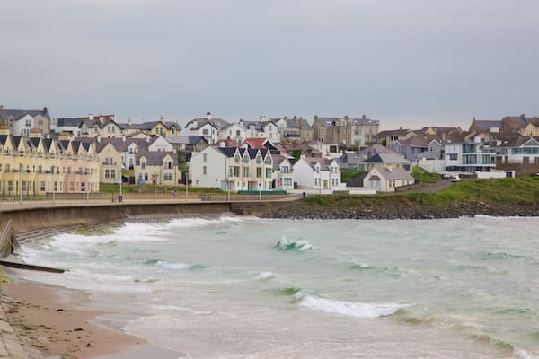 Portrush Beach featuring general coastal views, a coastal town and a sandy beach