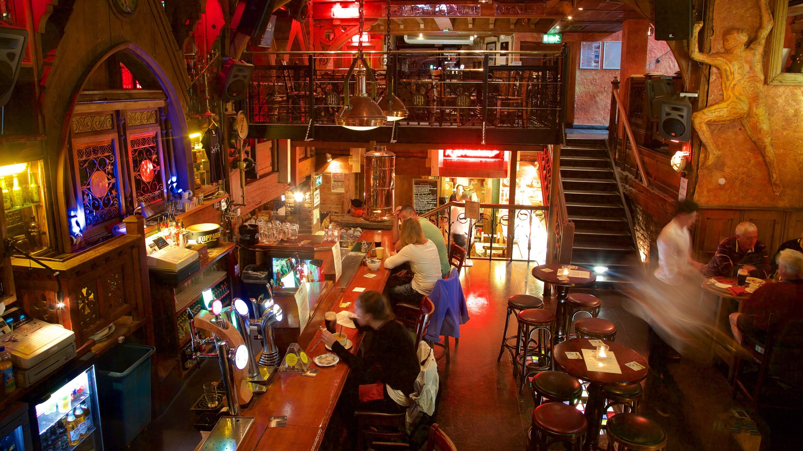 Galway showing a bar and interior views as well as a small group of people