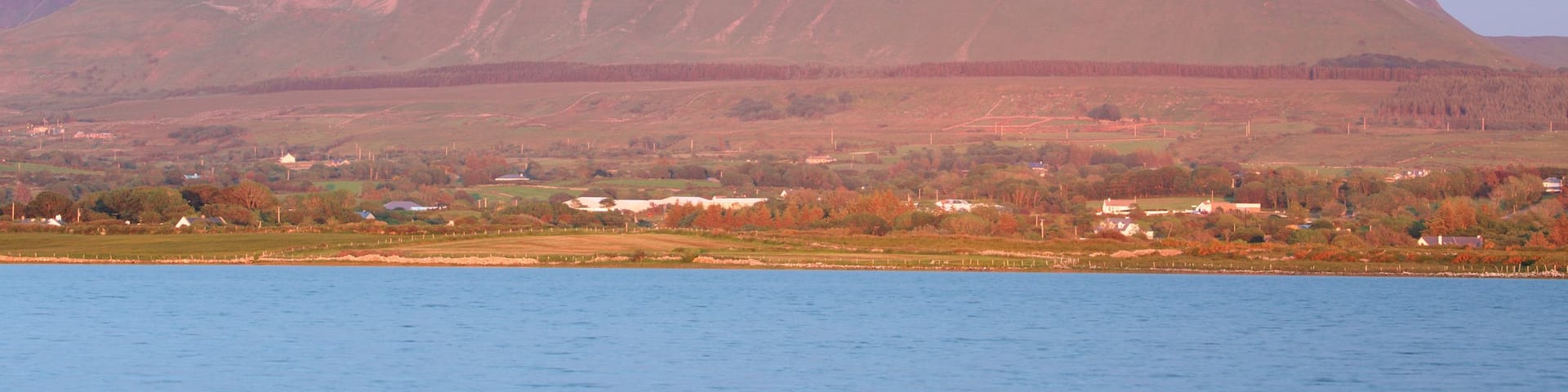 Ben Bulben which includes mountains and a river or creek