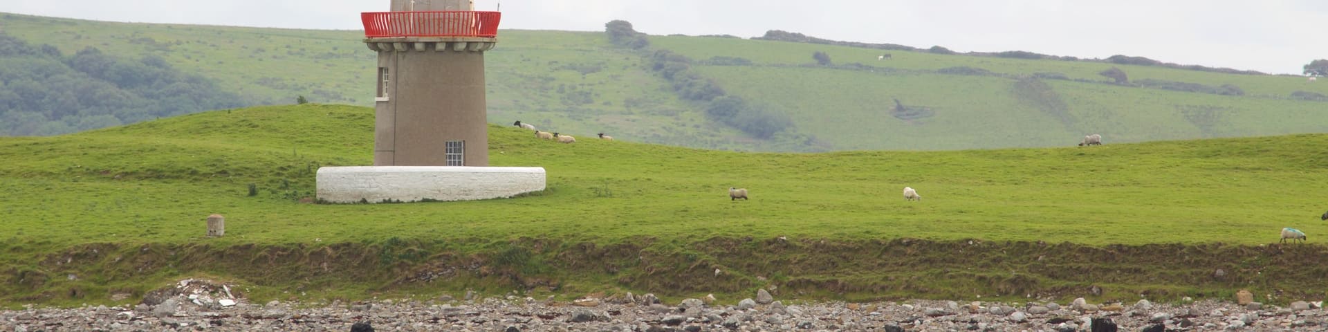 Rosses Point featuring tranquil scenes, a lighthouse and general coastal views