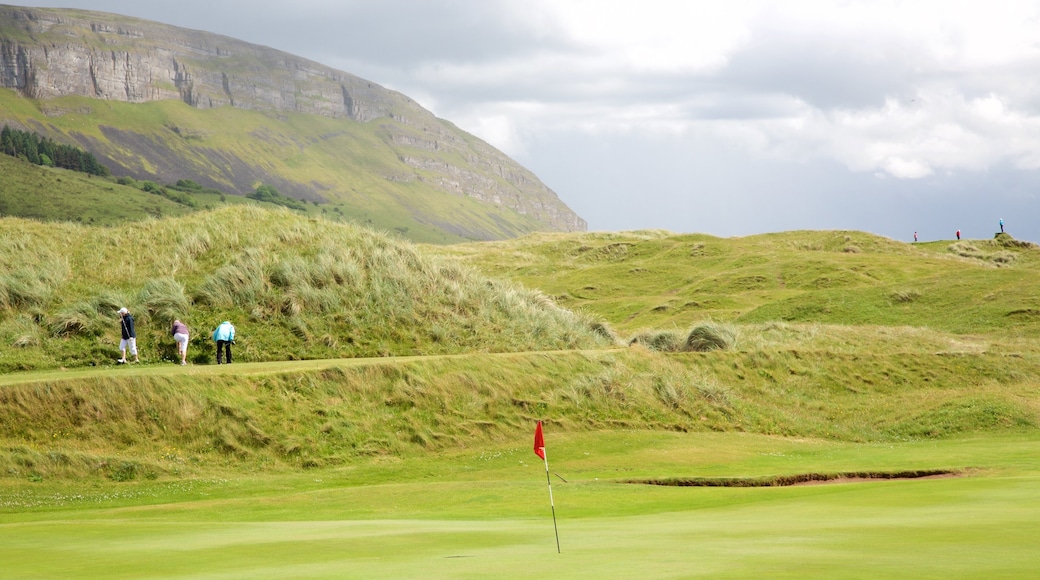 Knocknarea showing tranquil scenes and golf as well as a small group of people