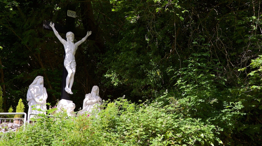 Tobernalt Holy Well featuring a garden and a statue or sculpture