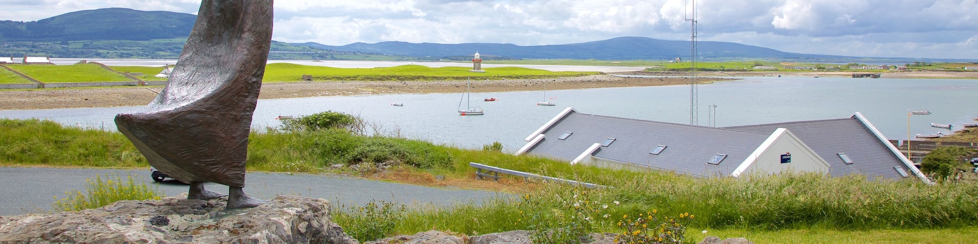 Rosses Point showing a bay or harbor, landscape views and a statue or sculpture