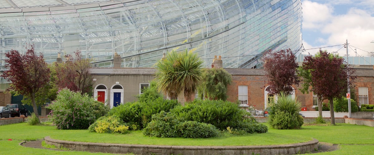 Aviva Stadium showing modern architecture, heritage architecture and a garden