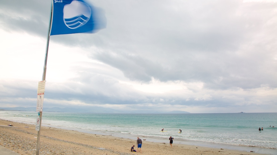 Banna Beach which includes general coastal views and a sandy beach as well as a small group of people