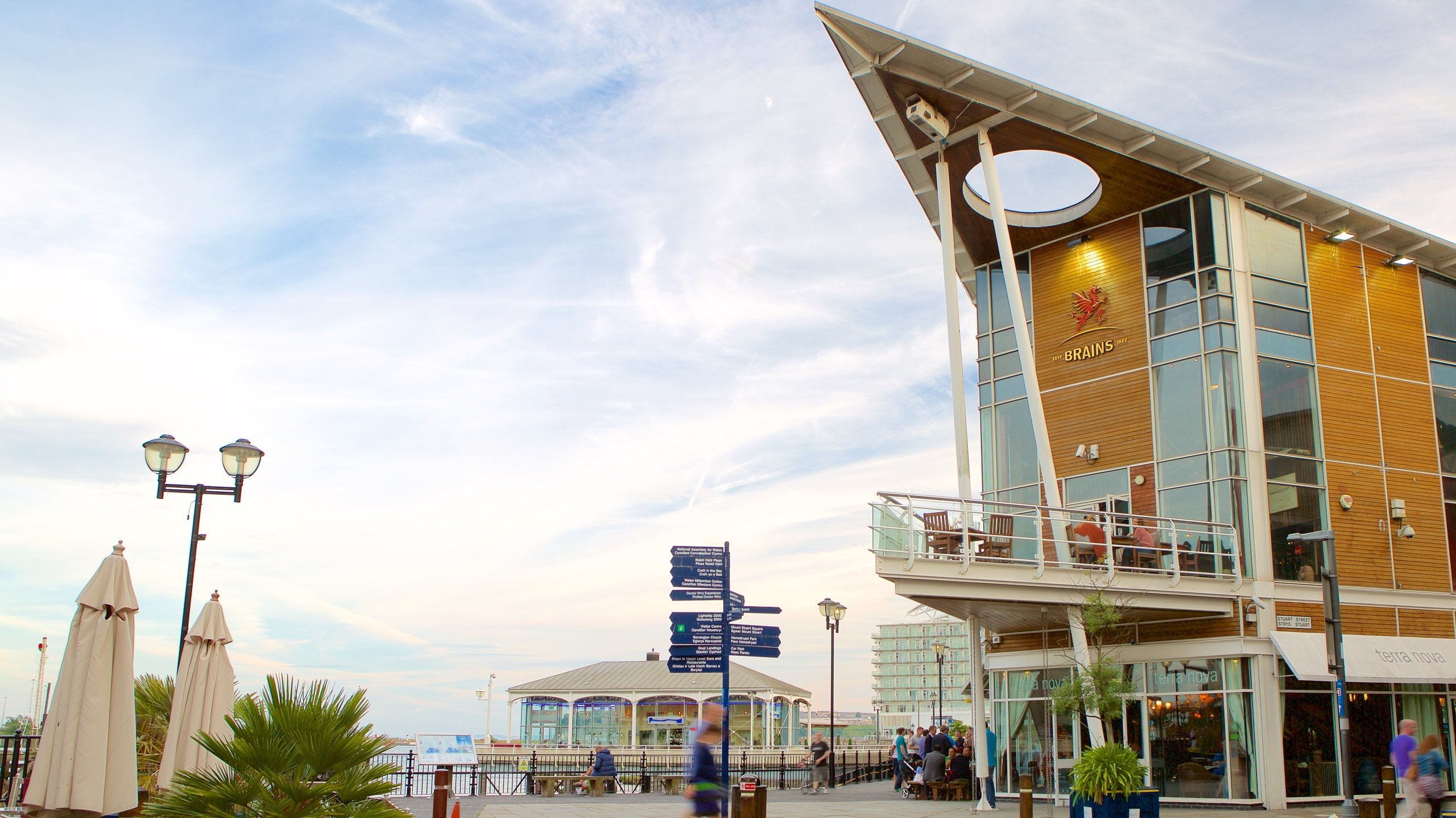 Mermaid Quay which includes a coastal town, a square or plaza and modern architecture