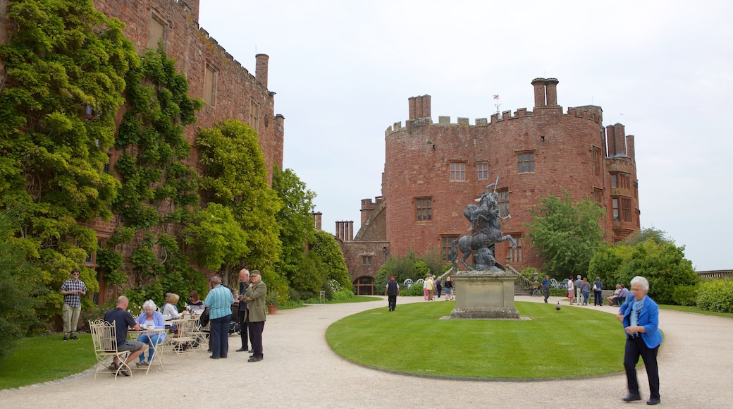 Welshpool showing a statue or sculpture, a castle and heritage elements