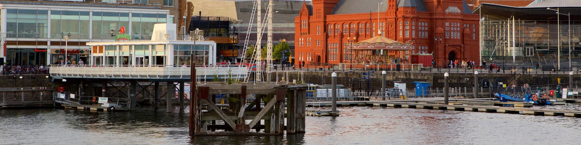 Mermaid Quay which includes heritage architecture, heritage elements and a church or cathedral