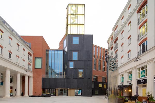 Metropolitan Arts Centre which includes a city and modern architecture