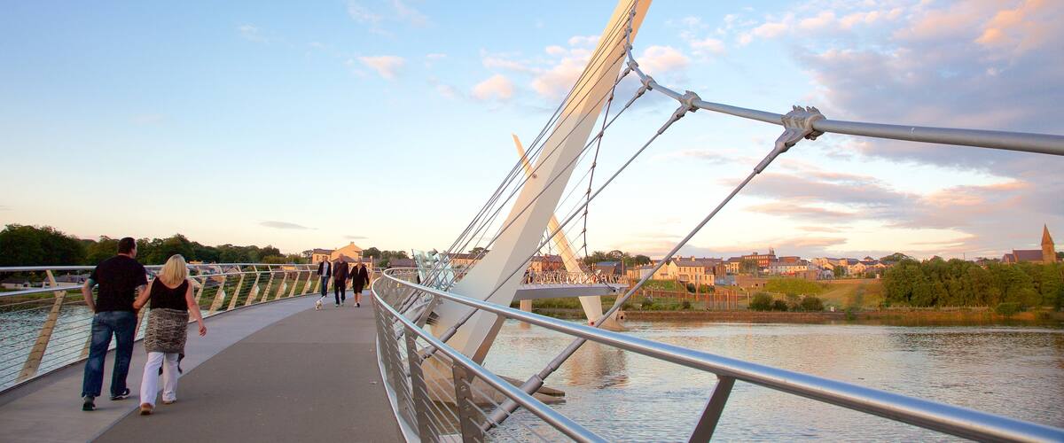 Peace Bridge which includes a bridge, modern architecture and a river or creek