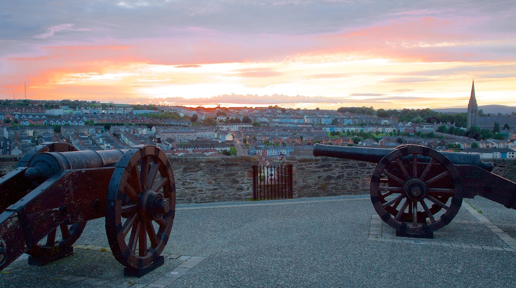 Derry City Walls featuring heritage elements, a city and a sunset