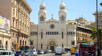 Prati ofreciendo una iglesia o catedral, escenas cotidianas y una ciudad