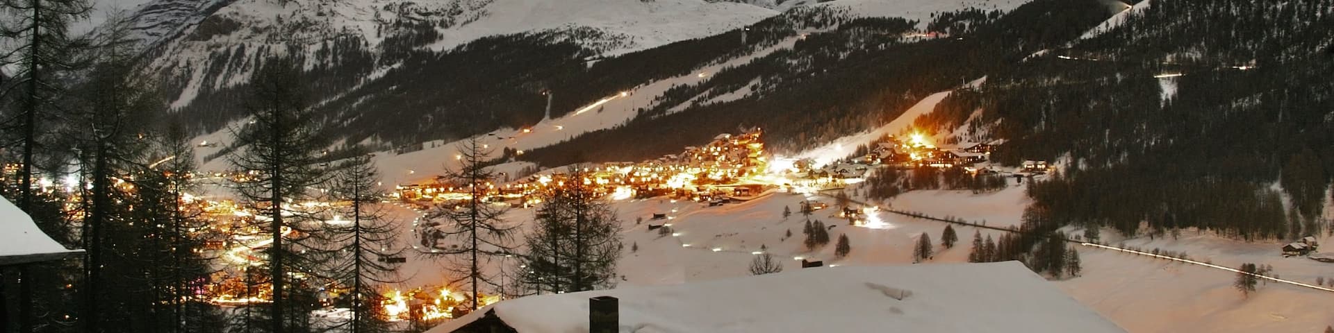 Livigno featuring mountains, landscape views and night scenes