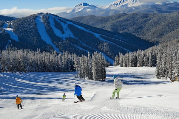 Keystone Ski Resort showing forests, landscape views and snow boarding