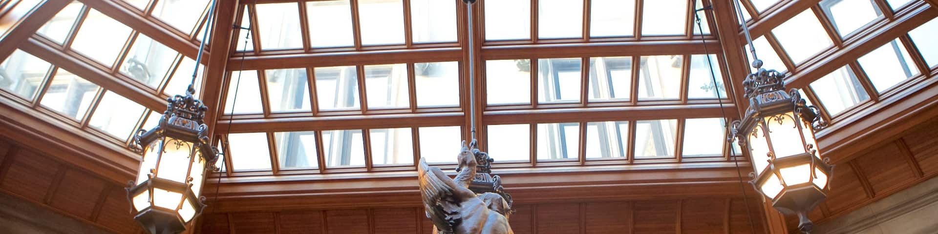 Biltmore Estate featuring a park, a statue or sculpture and interior views