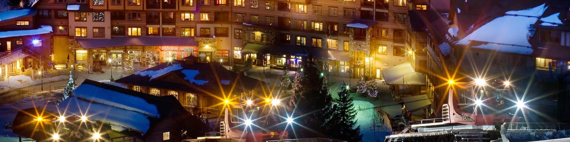 Winter Park qui includes hôtel ou complexe de luxe, neige et scènes de nuit