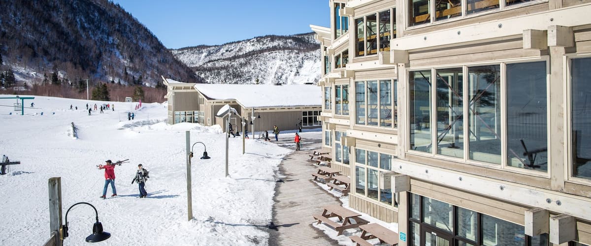 Marble Mountain showing a luxury hotel or resort as well as a small group of people