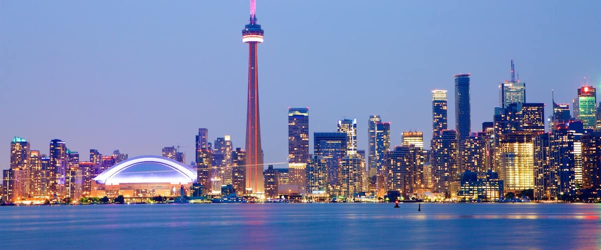 Toronto which includes a high rise building, a city and night scenes
