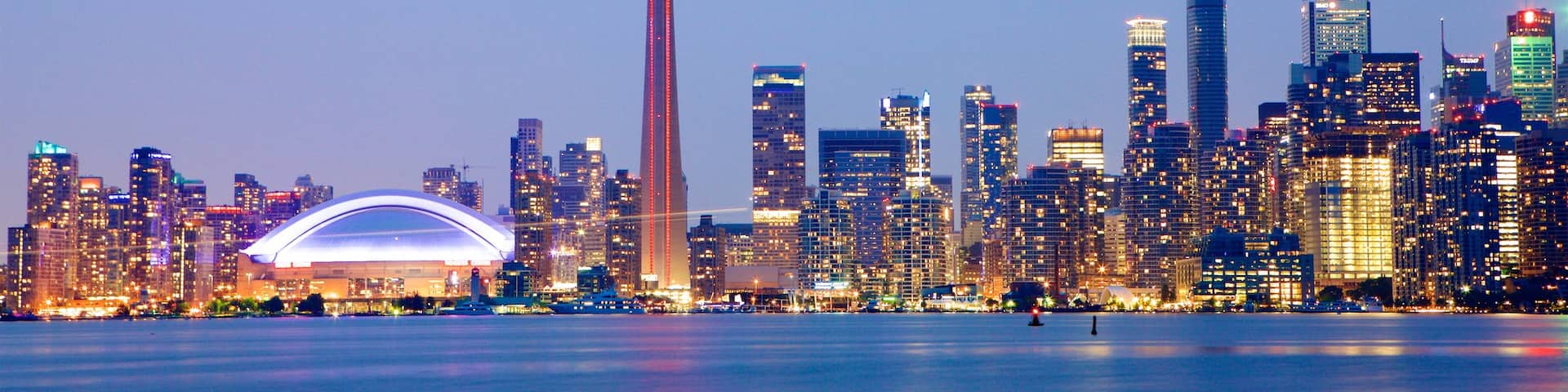 Toronto which includes a high rise building, a city and night scenes