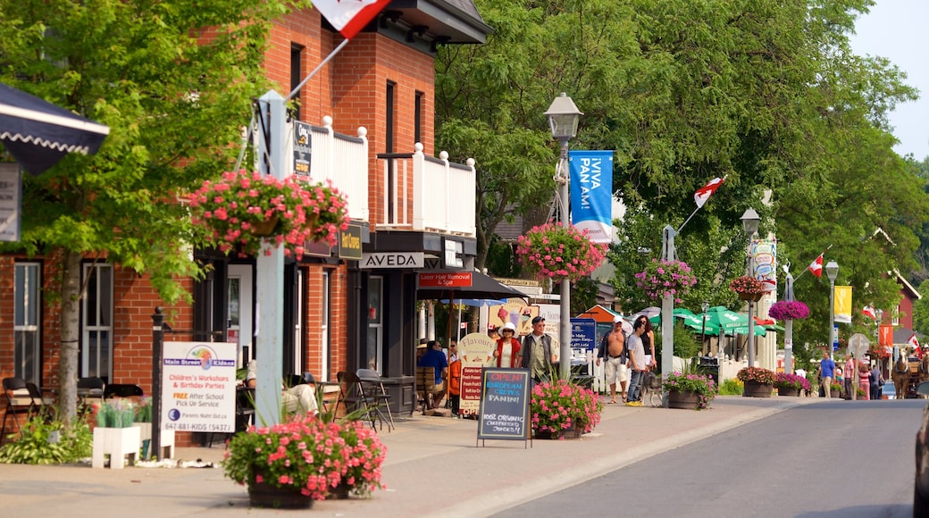 Markham featuring flowers and street scenes as well as a small group of people