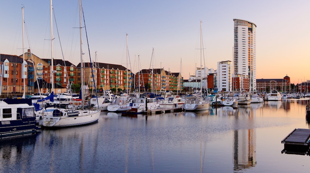 Swansea which includes a sunset, general coastal views and sailing