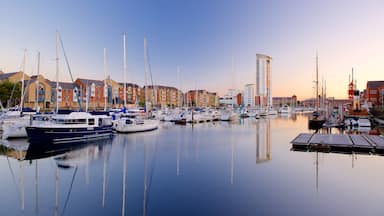 Swansea which includes general coastal views, a sunset and a marina