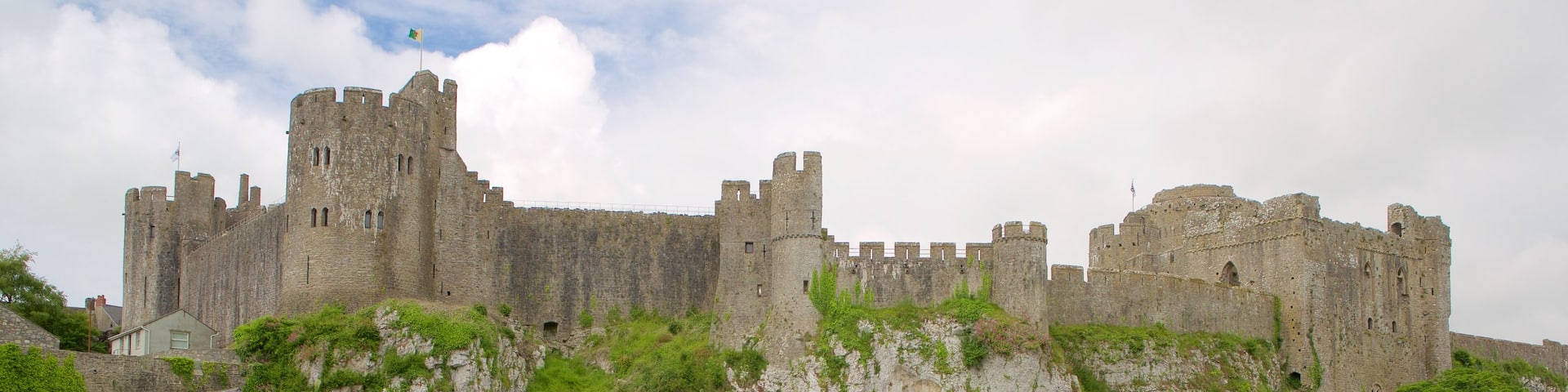 Pembroke Castle which includes chateau or palace, a river or creek and heritage elements