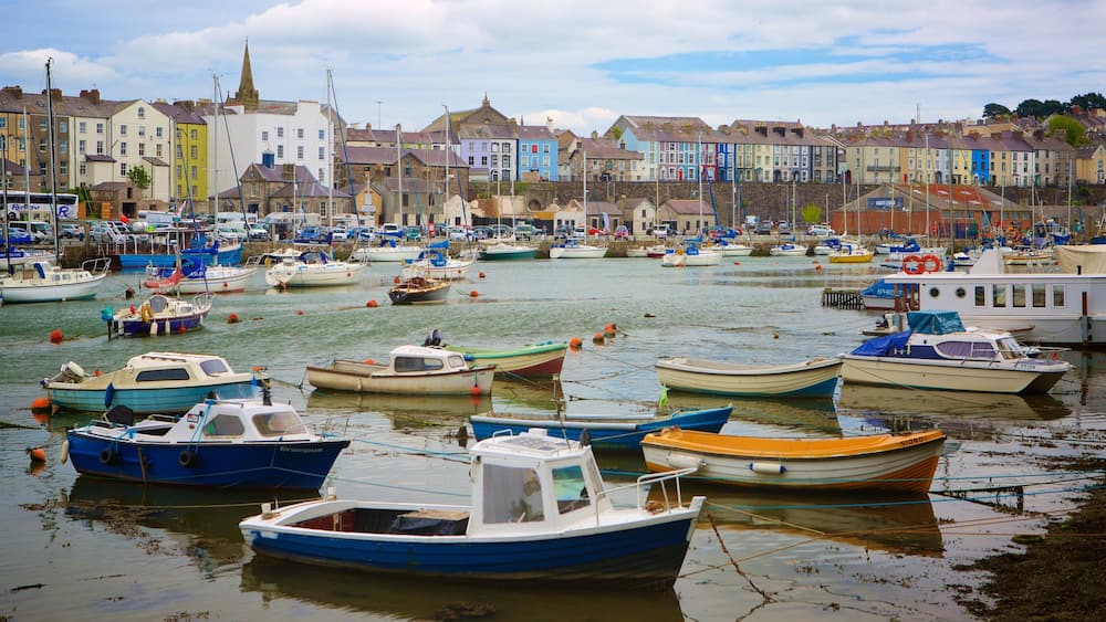 Caernarfon showing boating, a river or creek and a small town or village