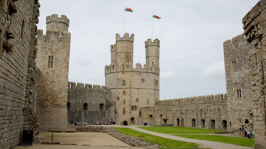 Caernarfon Castle featuring heritage elements and a castle