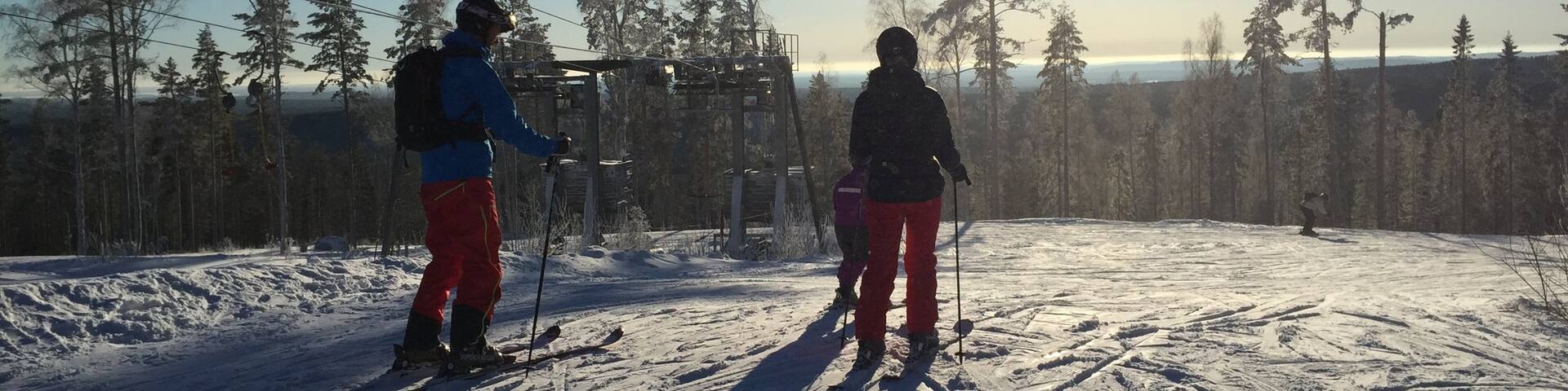 Kungsberget Ski Resort featuring snow skiing and snow as well as a small group of people