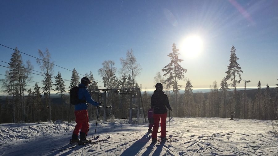 Kungsberget Ski Resort featuring snow skiing and snow as well as a small group of people