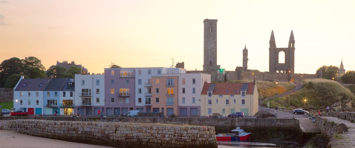 St. Andrew\'s Cathedral which includes a coastal town, a sunset and a beach
