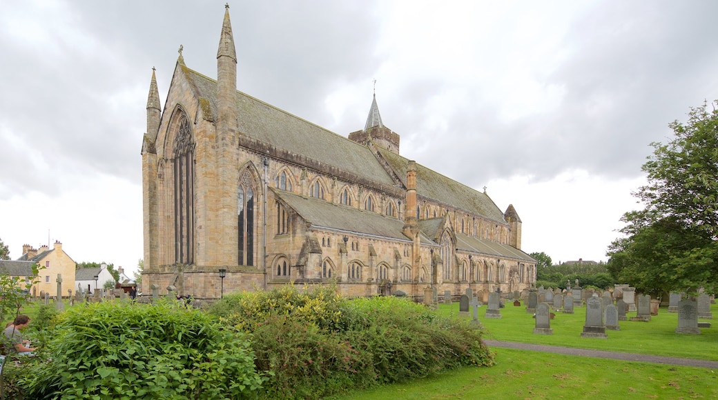 Dunblane Cathedral featuring a cemetery and a church or cathedral