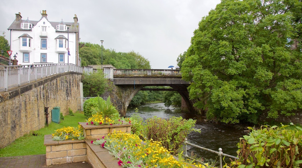 Dunblane showing a river or creek, a bridge and a small town or village