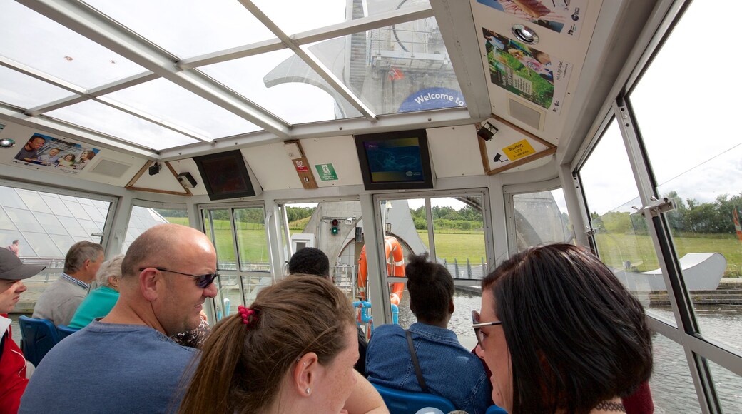 Falkirk Wheel showing boating and interior views as well as a large group of people