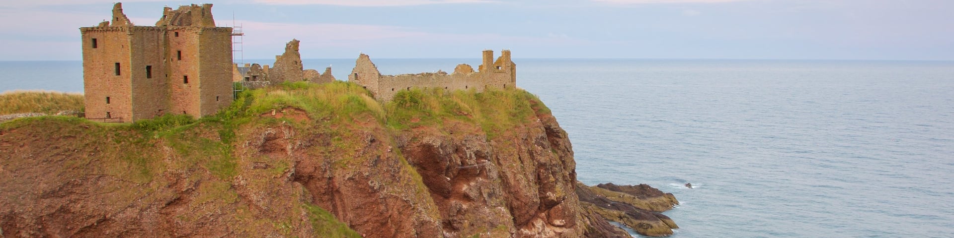 Dunnottar Castle featuring general coastal views and château or palace