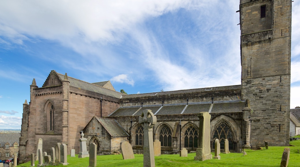 Church of the Holy Rude featuring a church or cathedral and a cemetery