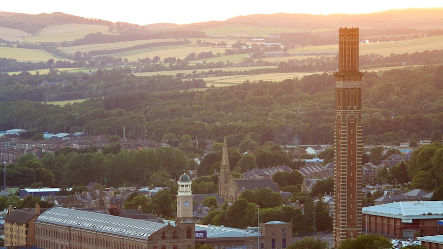 Dundee Law which includes a small town or village and a sunset