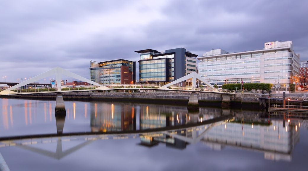 Glasgow which includes night scenes, a bridge and a river or creek