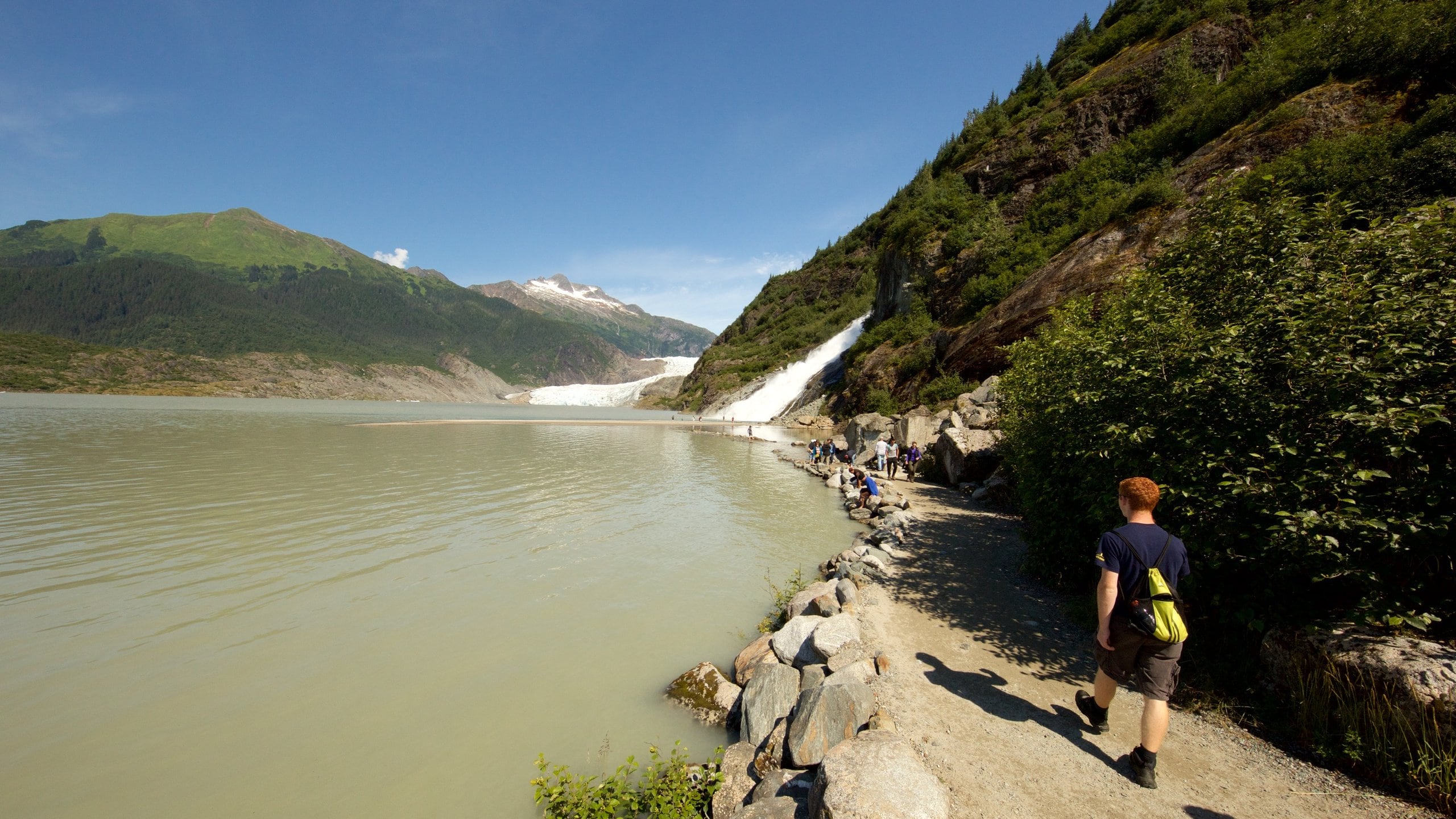 Mendenhall Glacier which includes a river or creek as well as an individual child